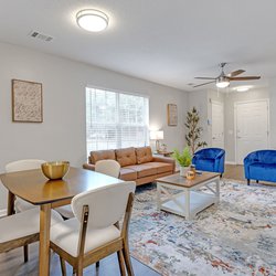 living room at Lakeview Oaks Apartments in Savannah, GA